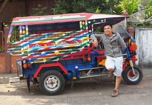 Your guide, Ere, and the Tuk Tuk Safari wheels